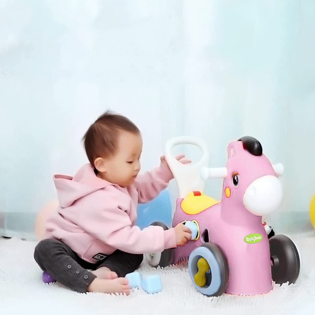 Baby playing horse toy hotsell